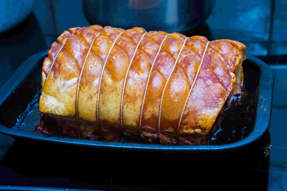Crackling roast pork cooked on a kettle BBQ, Hot Shots recipe